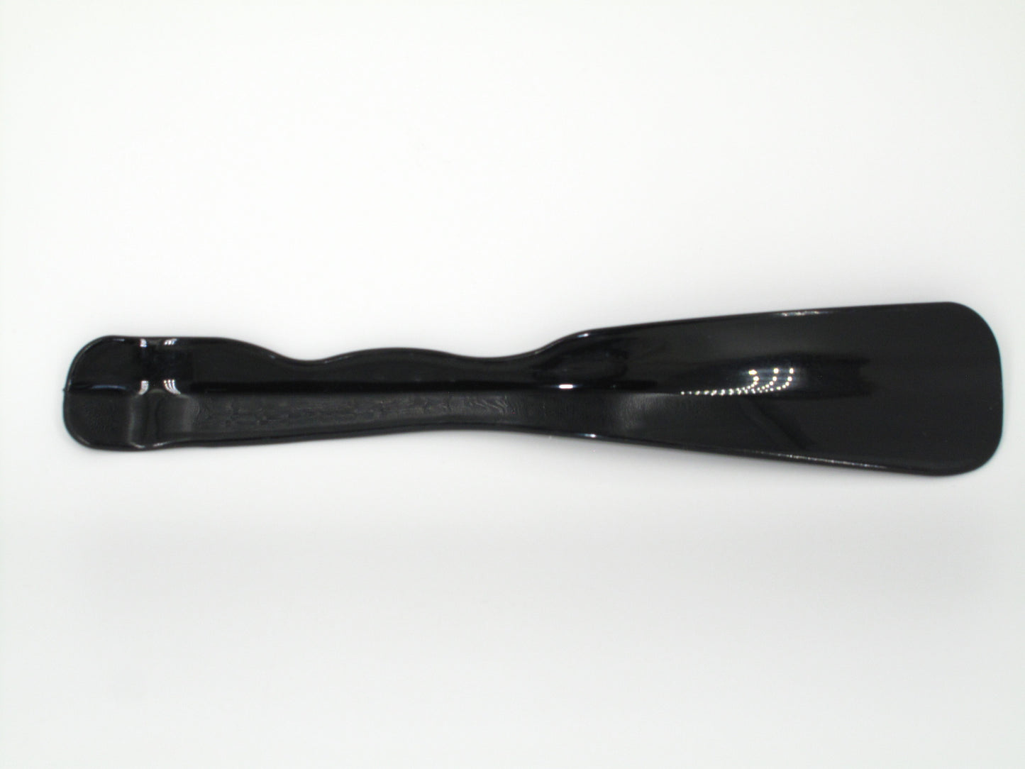 SKU - 1501 -- CALZADOR MEDIANO DE PLASTICO NEGRO