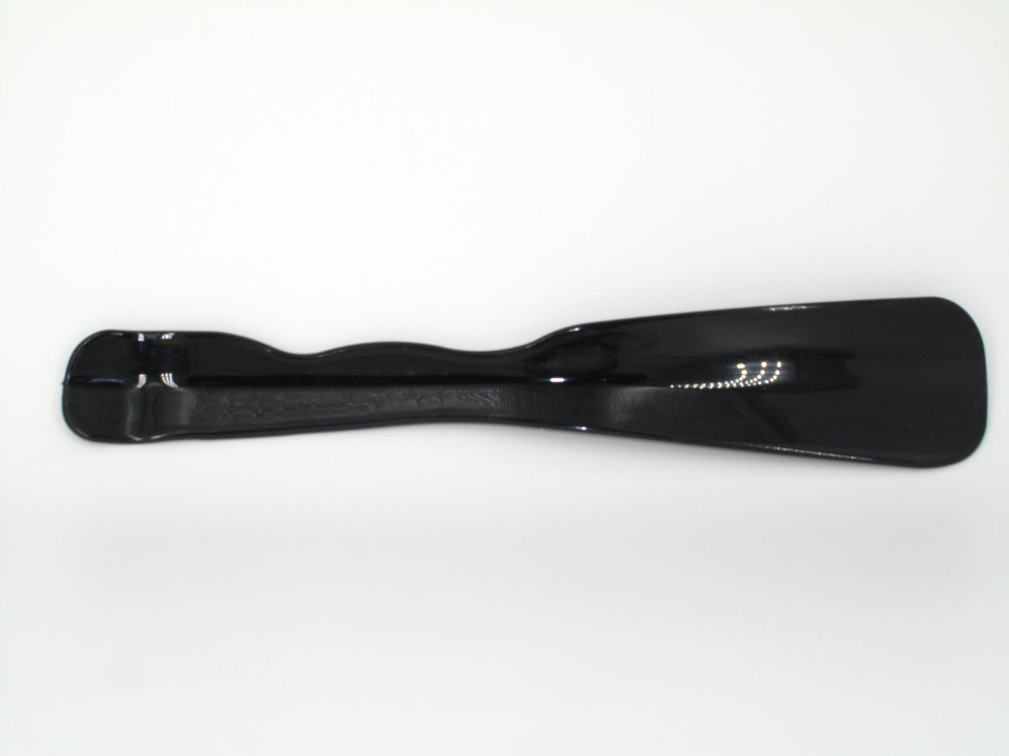 SKU - 1501 -- CALZADOR MEDIANO DE PLASTICO NEGRO